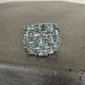 Stunning Aquamarine 5 Row Oval Shaped Anniversary Band in Sterling Silver